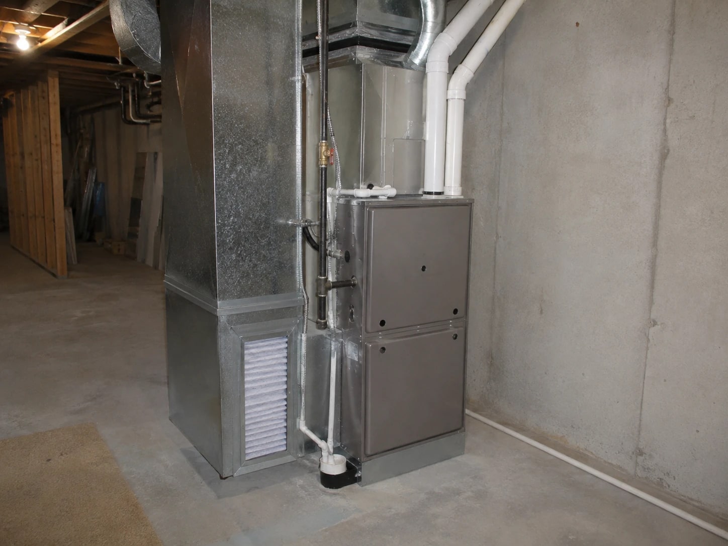 Main-floor system: furnace and accessible service area.