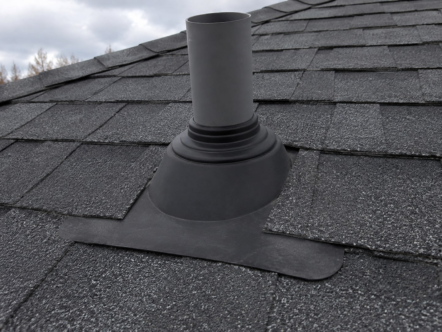 Visible plumbing-vent boot and surrounding shingles.