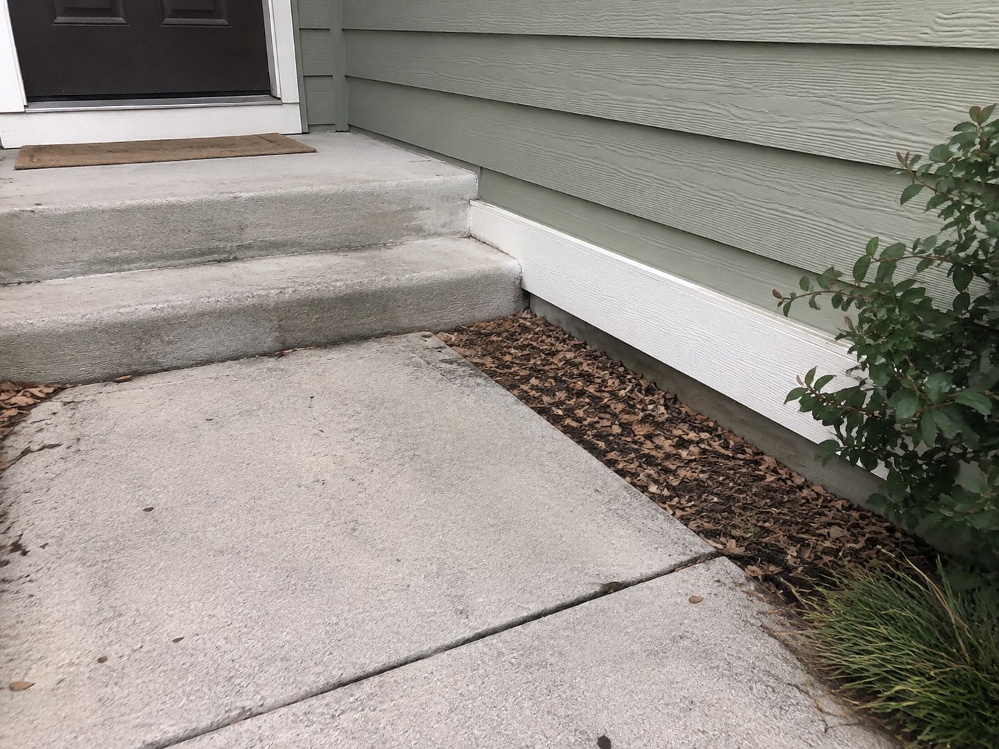 Front landing, approach joint and adjacent ground surface.